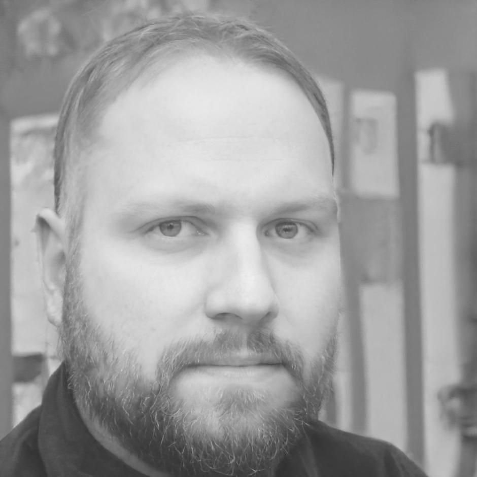 Henrik Voss, lead analytics consultant reviewing chatbot performance data